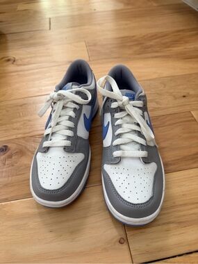 Nike, low-top, white with gray accents and blue swoosh, boys, 6Y